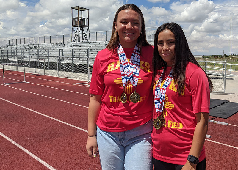Centennial High girls track standouts Lia Pili, left, and Lauren Ocampo took home three gold medals from the state 5A track and field championships on June 26 in Albuquerque.