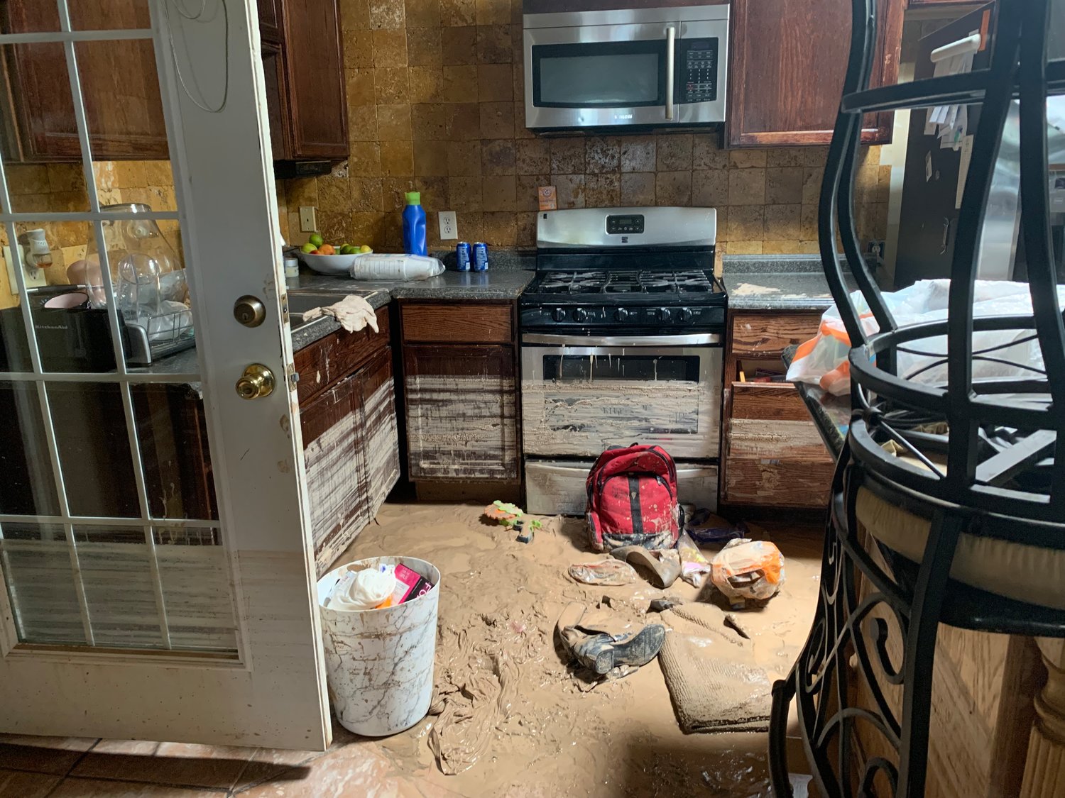 The Aguirre family kitchen will likely never see a meal cooked in it again as the home seems damaged beyond repair following the La Union floods.