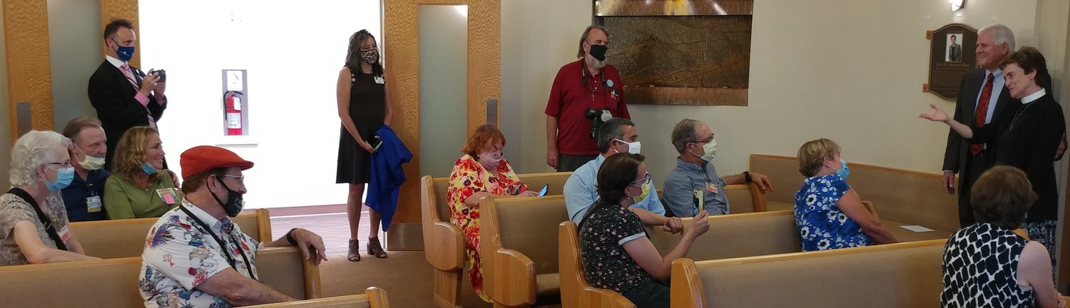 The Aug. 3 chapel dedication at Memorial Medical Center included hospital staff and volunteers. Standing at far right are MMC CEO John Harris and the Rev. Dr. Margaret Short.