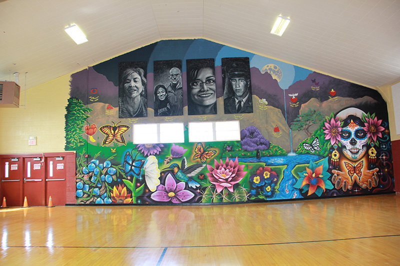Rio Grande Preparatory Institute students painted the "Wall of Healing" mural.