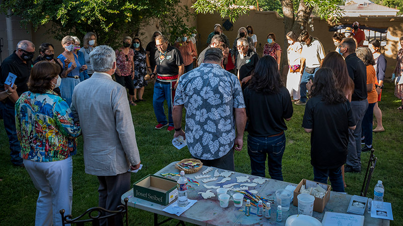 Members of Tortugas Pueblo, led by Cacique Patrick Narvaez, conduct a blessing ceremony during the Healing Wings project dedication.