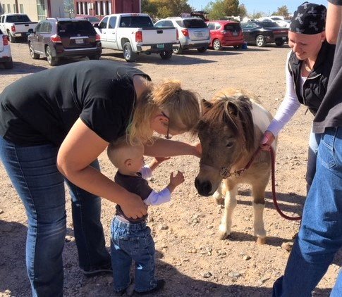 A pony makes a new friend at a past year’s AG Day event. AG Day is Sept. 25, 2021 at New Mexico State University. AG Day will feature family-friendly activities from 2 to 6 p.m., and admission is free. The NMSU football team takes on Hawaii following AG Day at 6 p.m.