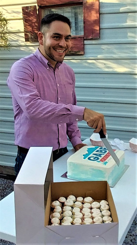 Las Cruces City Councilor Gabe Vasquez cuts the cake Saturday afternoon, Sept. 18, that was part of his announcement celebration as Vasquez declared his candidacy for the U.S. House of Representatives New Mexico District 2, which includes Las Cruces and all of southern New Mexico. The seat is currently held by Republican Yvette Herrell of Alamogordo. The Democratic and Republican primaries will be held in June 2022 and the general election in November.