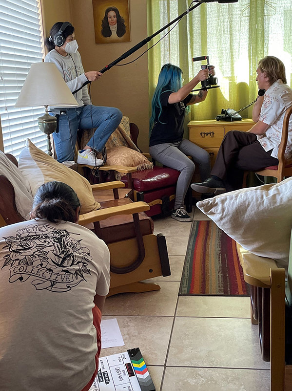 Left to right are director Ryan Rox (on the floor), crew members Dana Terrazas and Bella Luna and actor Nick Check on day one of filming “Crawl.”