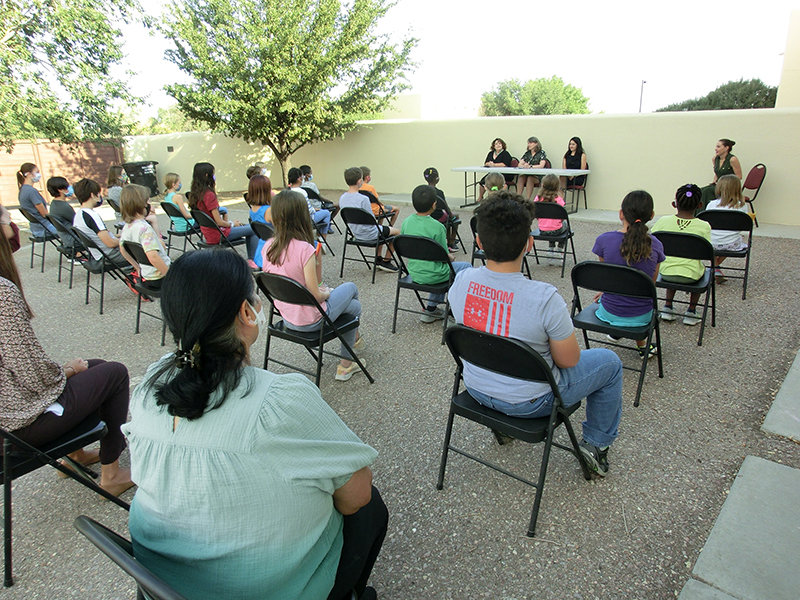 New Mexico Supreme Court justices, left to right, are Julie Vargas, C. Shannon Bacon and Briana Zamora with students at Las Cruces Academy.