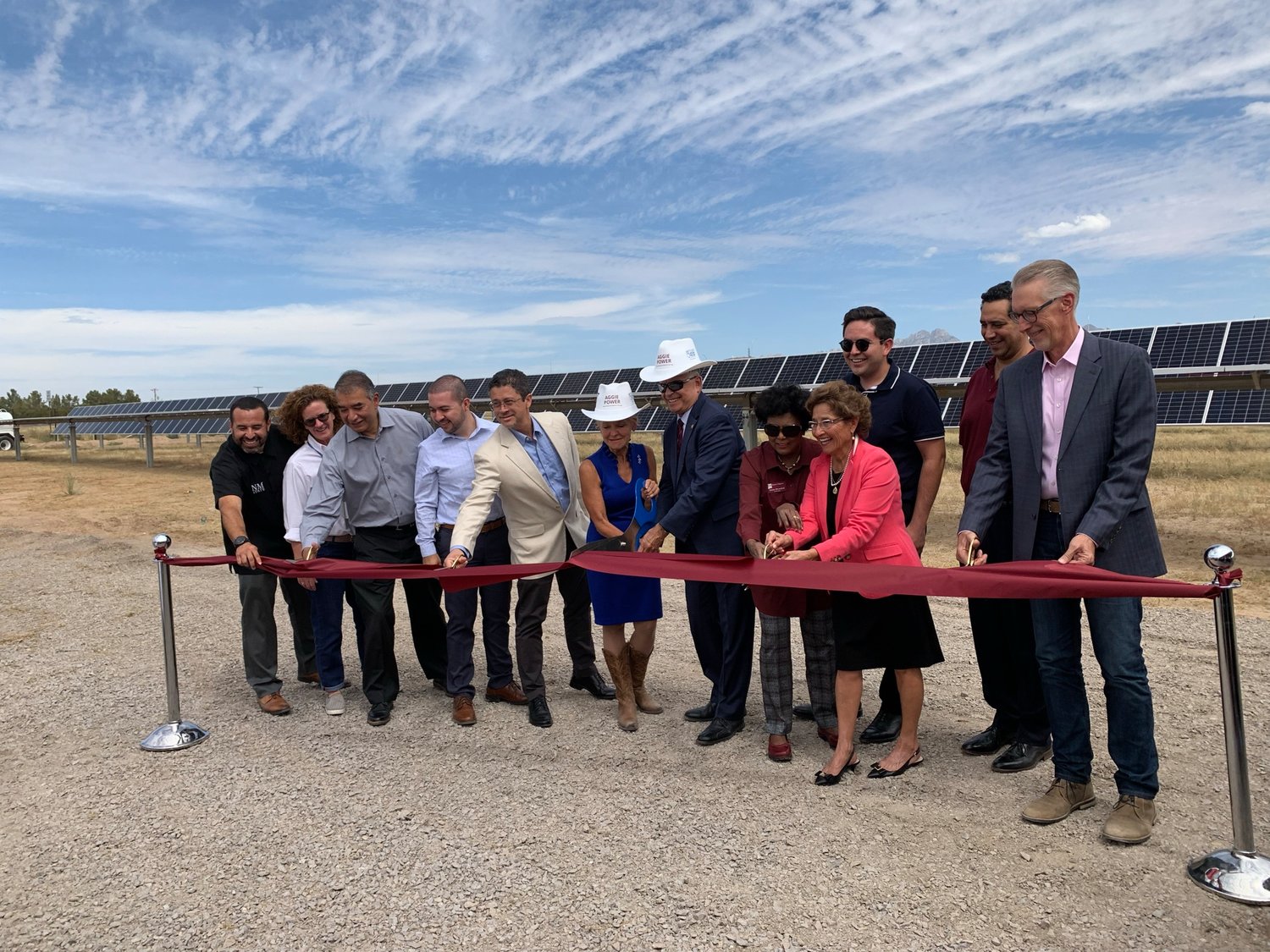 Officials cut the ribbon officially opening the Aggie Power, a planned 3-megawatt solar photovoltaic facility with about 10,000 solar panels on NMSU’s Arrowhead Park.
