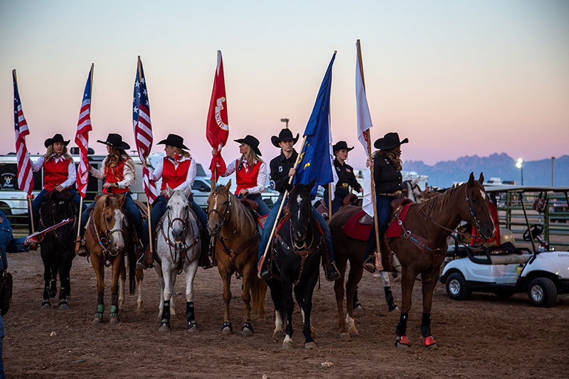 Southern New Mexico State Fair flag girls get ready to ride into the rodeo Saturday night, Oct. 2.