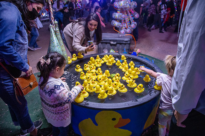 Kids try their luck at the duck game Saturday night, Oct. 2, at the Southern New Mexico State Fair.