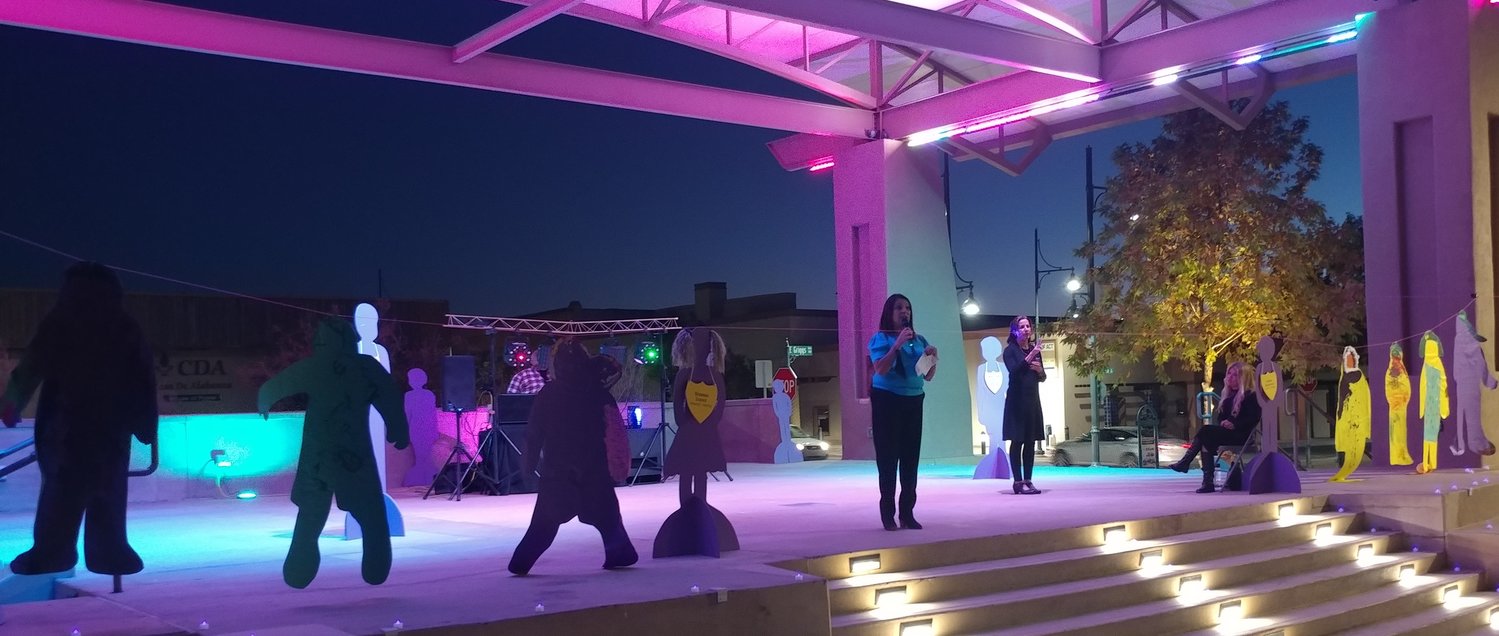 Las Cruces Mayor Pro Tempore Kassandra Gandara, a licensed social worker, was one of the speakers at 
La Casa’s 24th annual Candlelight Vigil, held Oct. 21 at Plaza de Las Cruces. The cutouts represent victims of domestic violence.