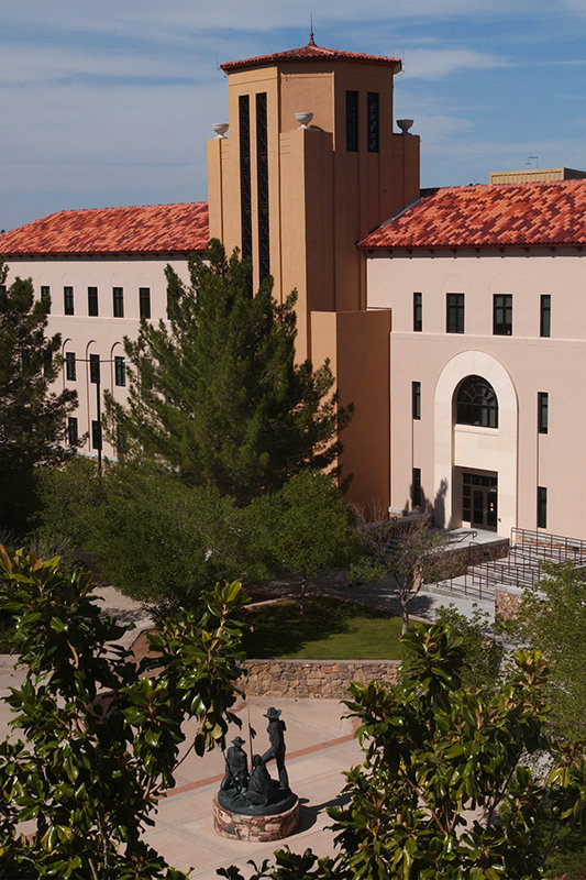 A view of the new Health and Social Sciences building including Memorial Tower.