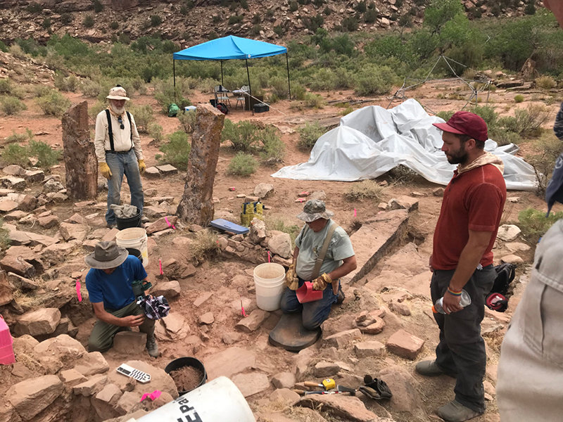 Braeden Dimitroff, Daniel Hampson, and Jessica Weinmeister at an archaeological site near San Juan River in southern Utah.