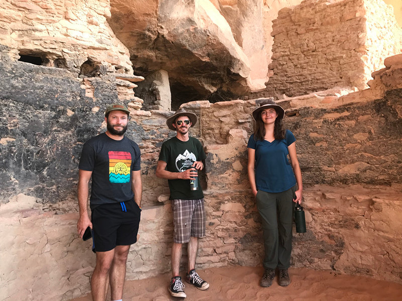 Braeden Dimitroff, Daniel Hampson, and Jessica Weinmeister at an archaeological site near San Juan River in southern Utah.