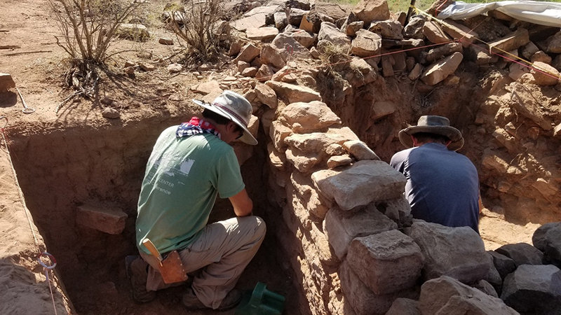 Anthropology Professor Fumi Arakawa is seen here excavating the exterior wall of the western great house as Daniel Hampson excavated inside the room. Both Arakawa and Hampson tried to reach the bottom of the interior (room) and exterior wall.