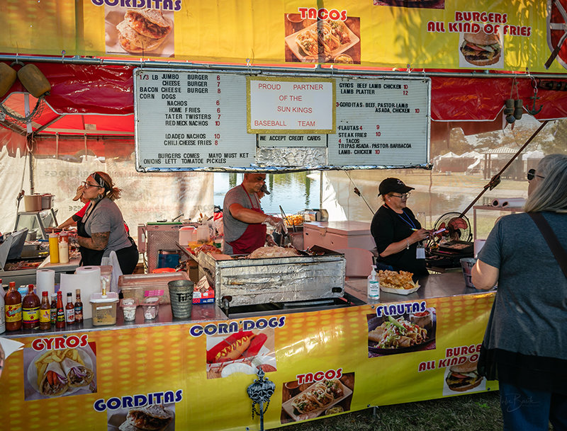 Famous JJ's Place, which partners with the Sun Kings Baseball Team, was a vendor at the 50th annual Renaissance Faire at Young Park.