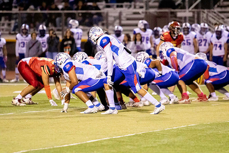 Las Cruces High used a tough defense and ground-control offense in the second half to secure a 35-21 quarterfinal win over Centennial in the state 6A football playoffs.