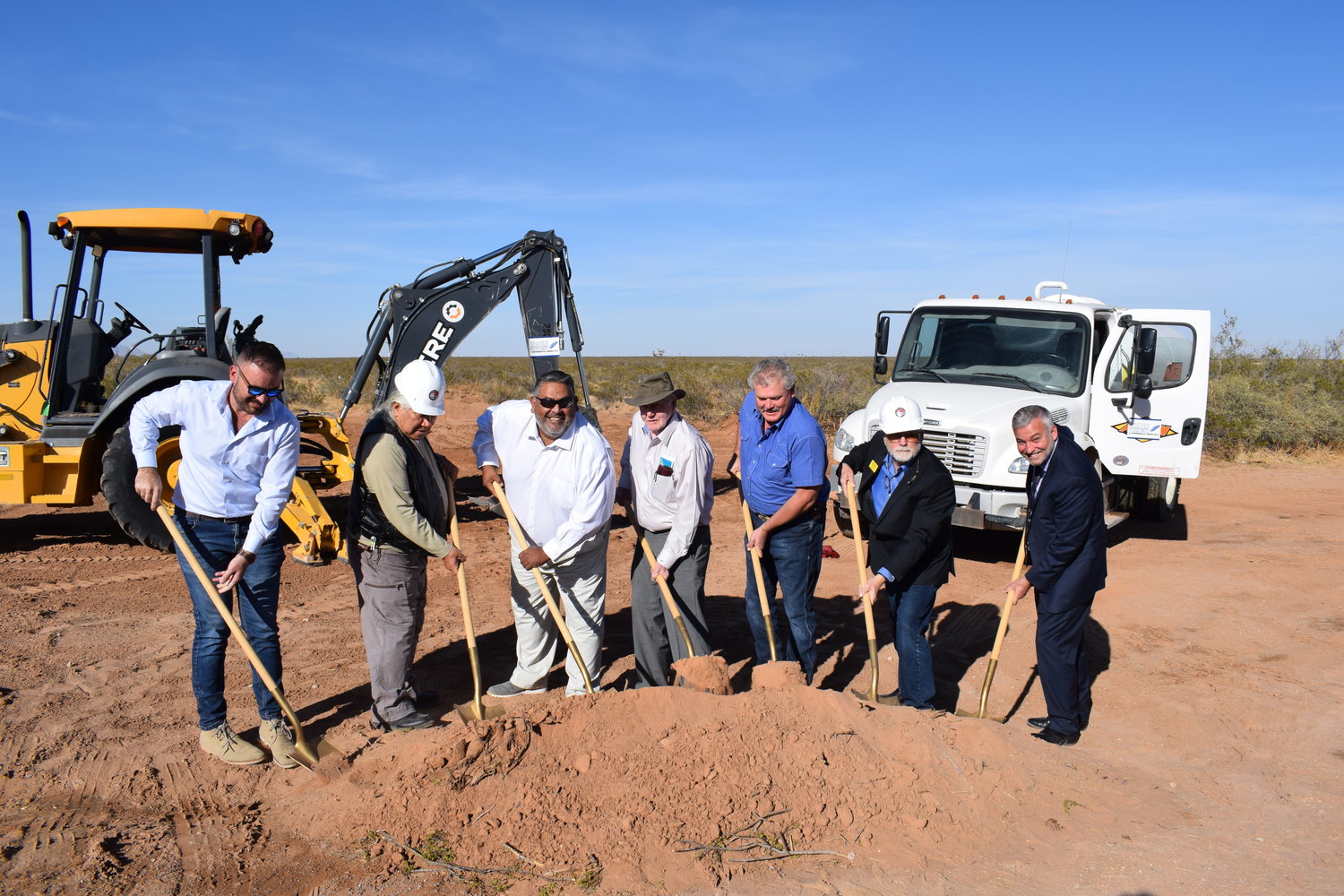 Left to right at the Nov. 19 BMX pump track groundbreaking in Chaparral, New Mexico are, left to right, Sam Askar of Global Maven Enterprises construction company of Las Cruces, the project’s general contractor; Ray Aldaz, a community advocate and member of the Chaparral Community Development Association (CCDA); State Rep. Willie Madrid, state representative, District 53, D-Doña Ana, Otero counties; Lake Section Water Company of Chaparral owner John Colquitt; CCDA member Alex Wright, who is the son of former state Rep. Delores C. Wright, who represented Doña Ana County (District 52) in the New Mexico House of Representatives, 1993-2001; Doña Ana County Commissioner Shannon Reynolds; and Doña Ana County Assistant Manager Chuck McMahon.