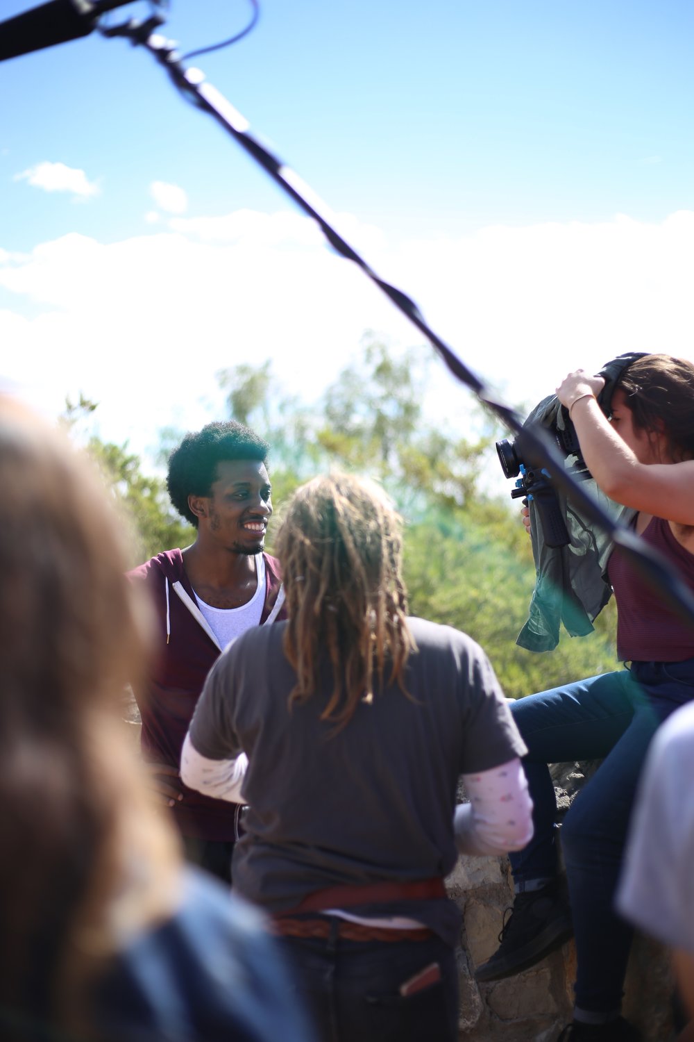 Julian Alexander on the set with other filmmakers and crew members.