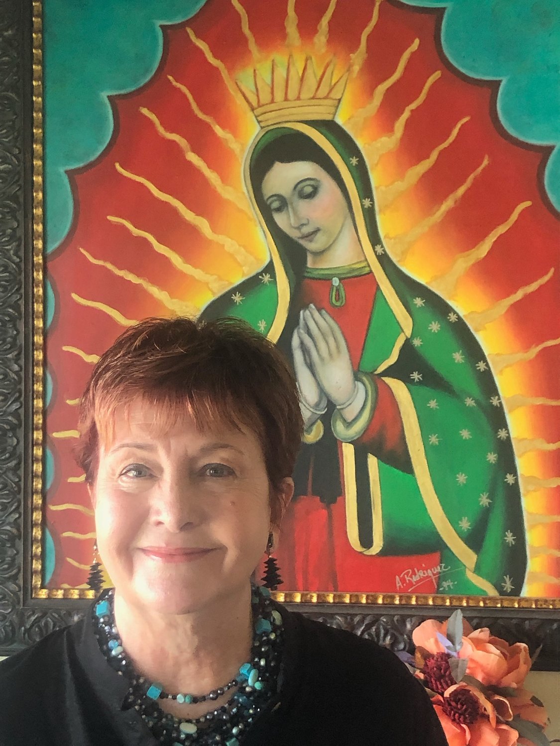Kathleen Keys, with Our Lady of Guadalupe watching over her.