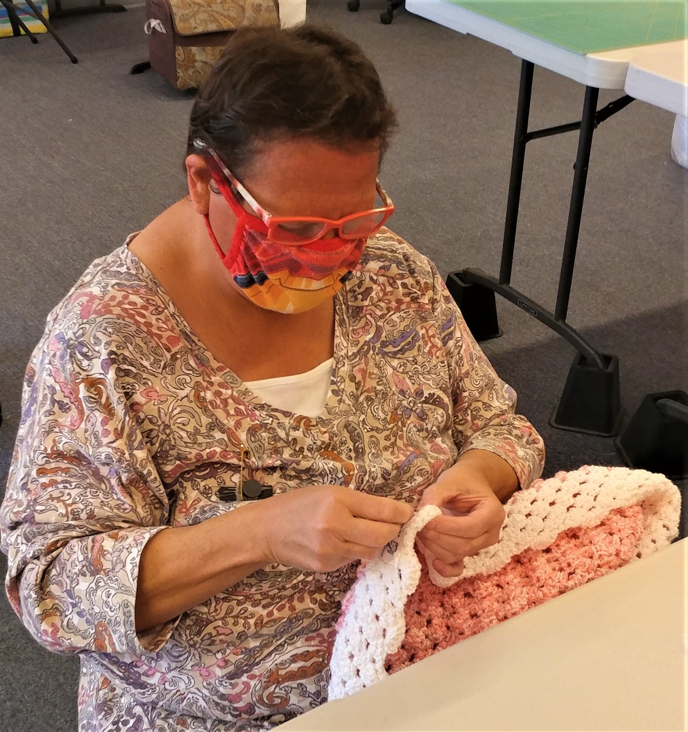 Project Linus Las Cruces chapter member Ginny Knowles sewing a blanket at ThreadBear, 2205 S. Main St.