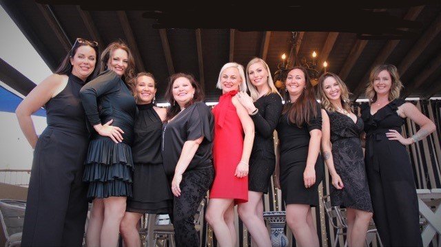 Last summer's photoshoot for The Association included, left to right, Marci Dickerson, Marcy Teague, Kori Connole, Christi Getz, Sumer Rose-Nolen, Leigh Cooper, Tanya Martinez, Shiela Bardwell and Chelsie Carter.