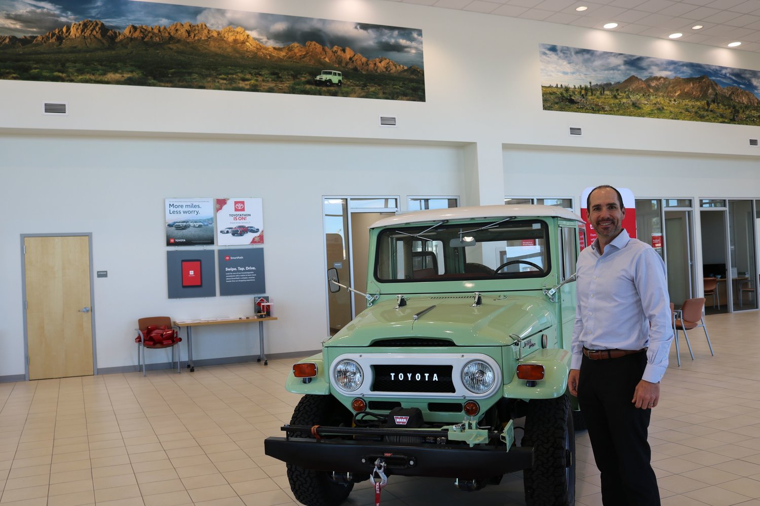 George Vescovo with the Jeep he bought from his father. It is also pictured in the photo above him at Vescovo Toyota of Las Cruces.