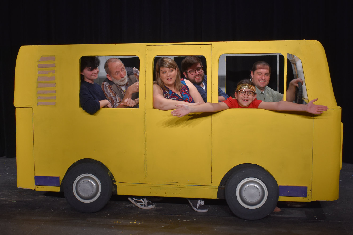 Pushing the bus in a rehearsal of Las Cruces Community Theatre’s upcoming production of “Little Miss Sunshine” are, left to right, Amanda Bradford, James Boberg, Kayla Bradford, Brandon Brown, Jason Wyatt and Hyde Brown.