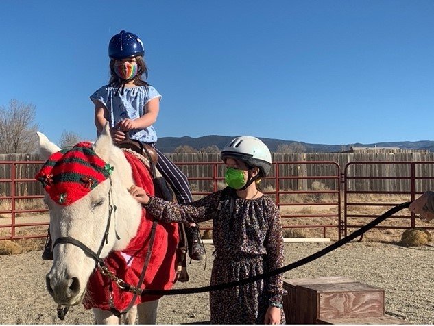 The horse-loving daughters of state Rep. Kristina Ortez, D-Taos, are Vida, 7, on the horse, and Gilly, 9.