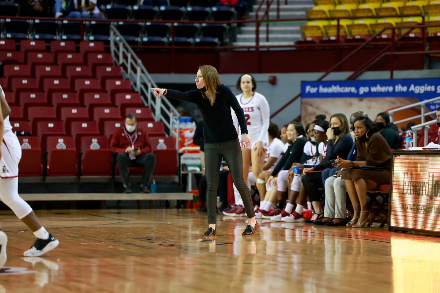 New Mexico State University women’s basketball coach guides her team against Sam Houston State Jan. 20.