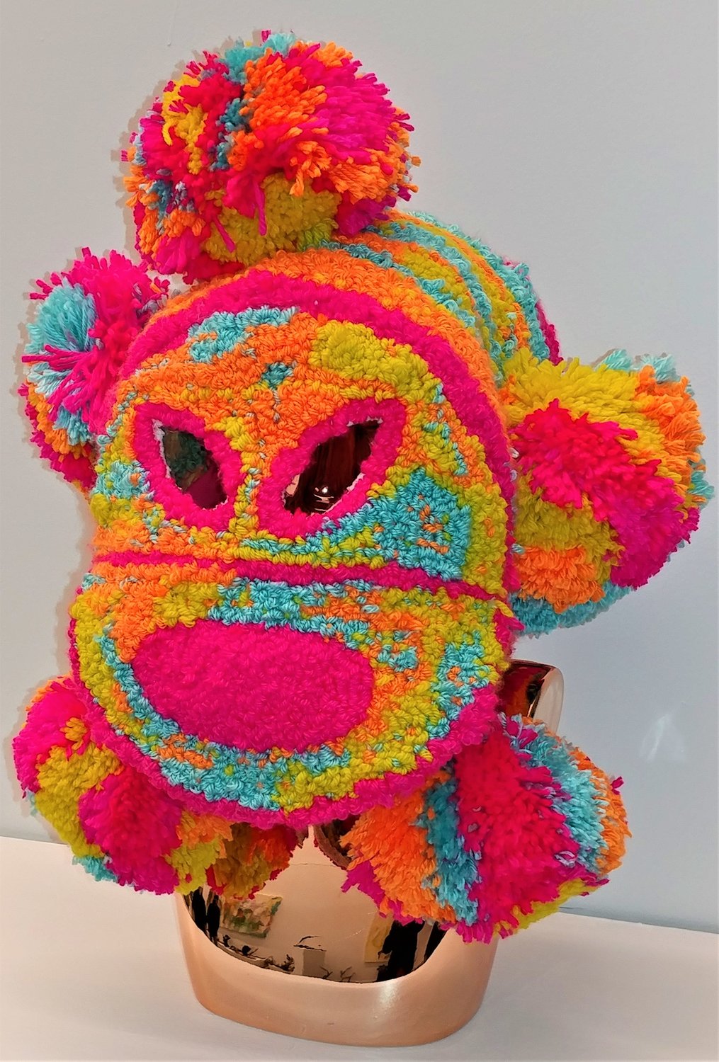 “Hijes Del Sol Y El Mar,” by Elizabeth Peralta. The exhibit, created in 2021, is acrylic and wool yarn, thread, monks cloth, glue, liquid latex and felt. It “unapologetically claims the wearer's Indigenous ancestry,” UAM said, and “offers the viewer a moment of connection.” Visit www.handtoolsofresilience.com.