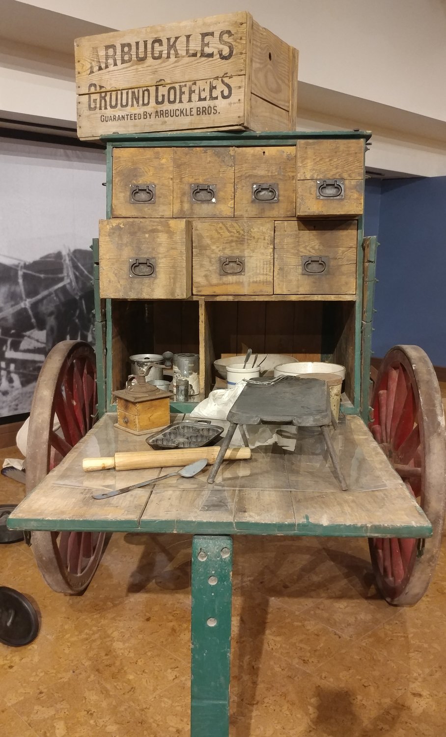 “Rancher Charles Goodnight is credited with inventing the chuckwagon,” according to the text that goes with this exhibit that is part of “Riding Herd.” Goodnight “added a chuck box to a U.S. Army wagon to create a traveling commissary that accompanied cattle drives.”