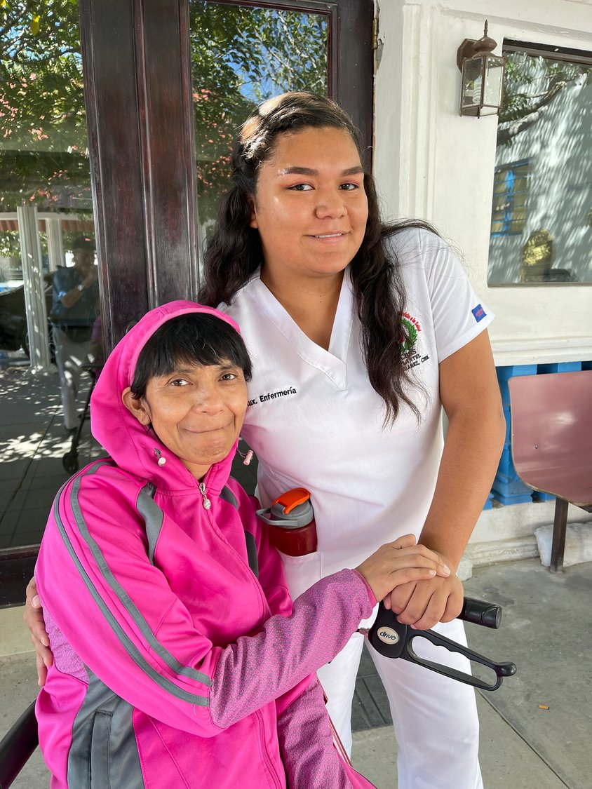Socorro, dementia patient with her nurse.