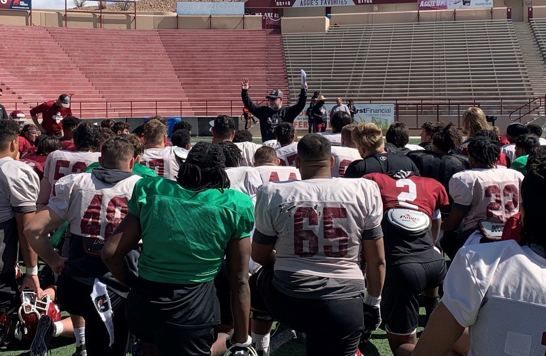 New Mexico State football coach Jerry Kill talks to his players during the first week of spring practice March 17 at Aggie Memorial Stadium.
