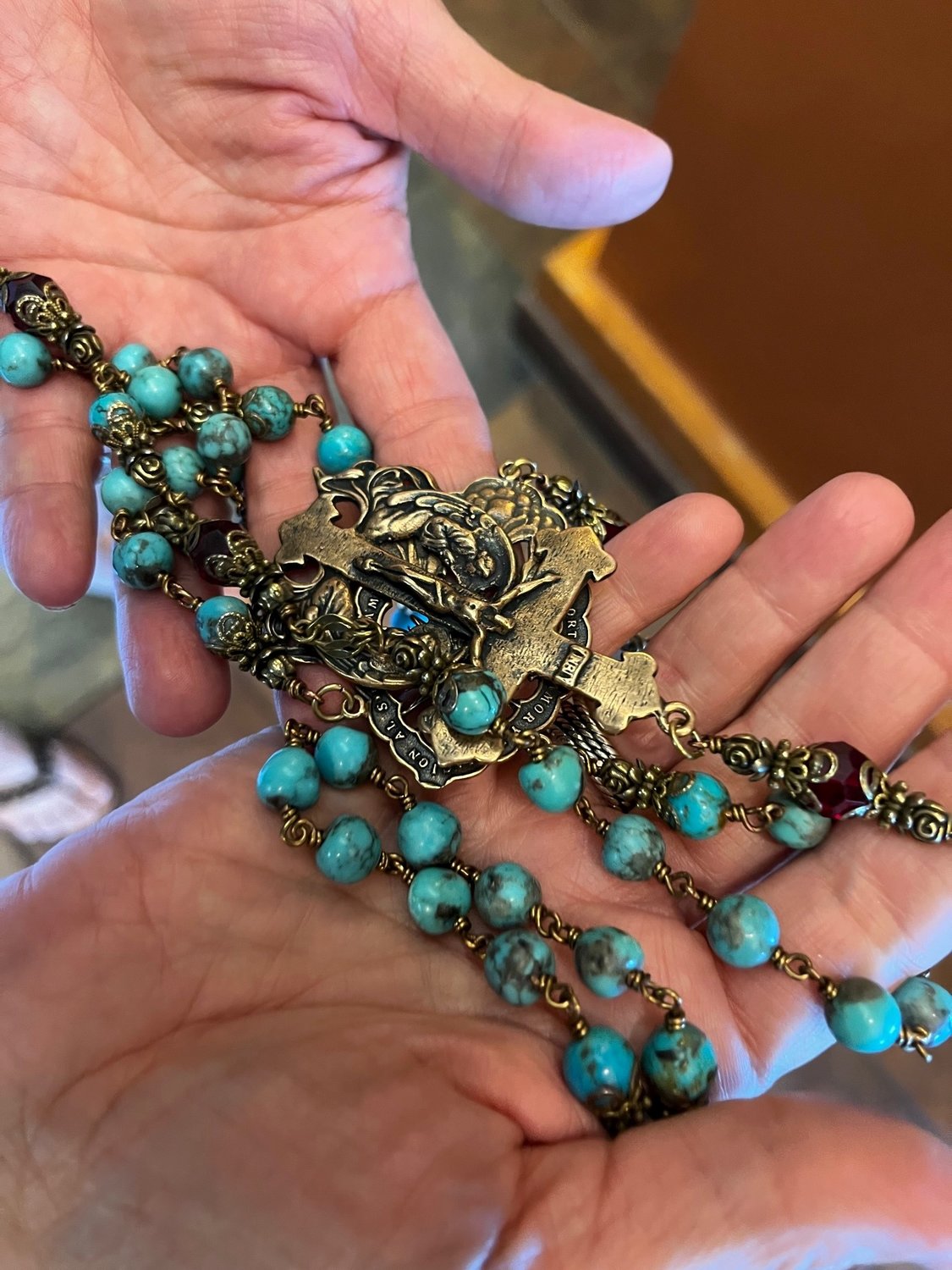 This rosary chain, custom made for Lupe Rodriguez-Jaramillo, is identical to the one she had made several years ago by an artisan in Santa Fe. When it was made, she had lots of extra turquoise left over and, “for some reason, I hung onto the extra,” she said. When her son, SFC Antonio Rey Rodriguez, died in combat in Afghanistan in 2020, she wanted him to be buried with the original rosary. She later took the extra turquoise back to the artisan, who crafted this duplicate, which she carries with her constantly. A golf tournament takes place today at New Mexico State University Golf Course, a fundraiser for Rodriguez’s memorial scholarship and foundation, the Antonio Rey Rodriguez Foundation, www.arrfoundation.org.