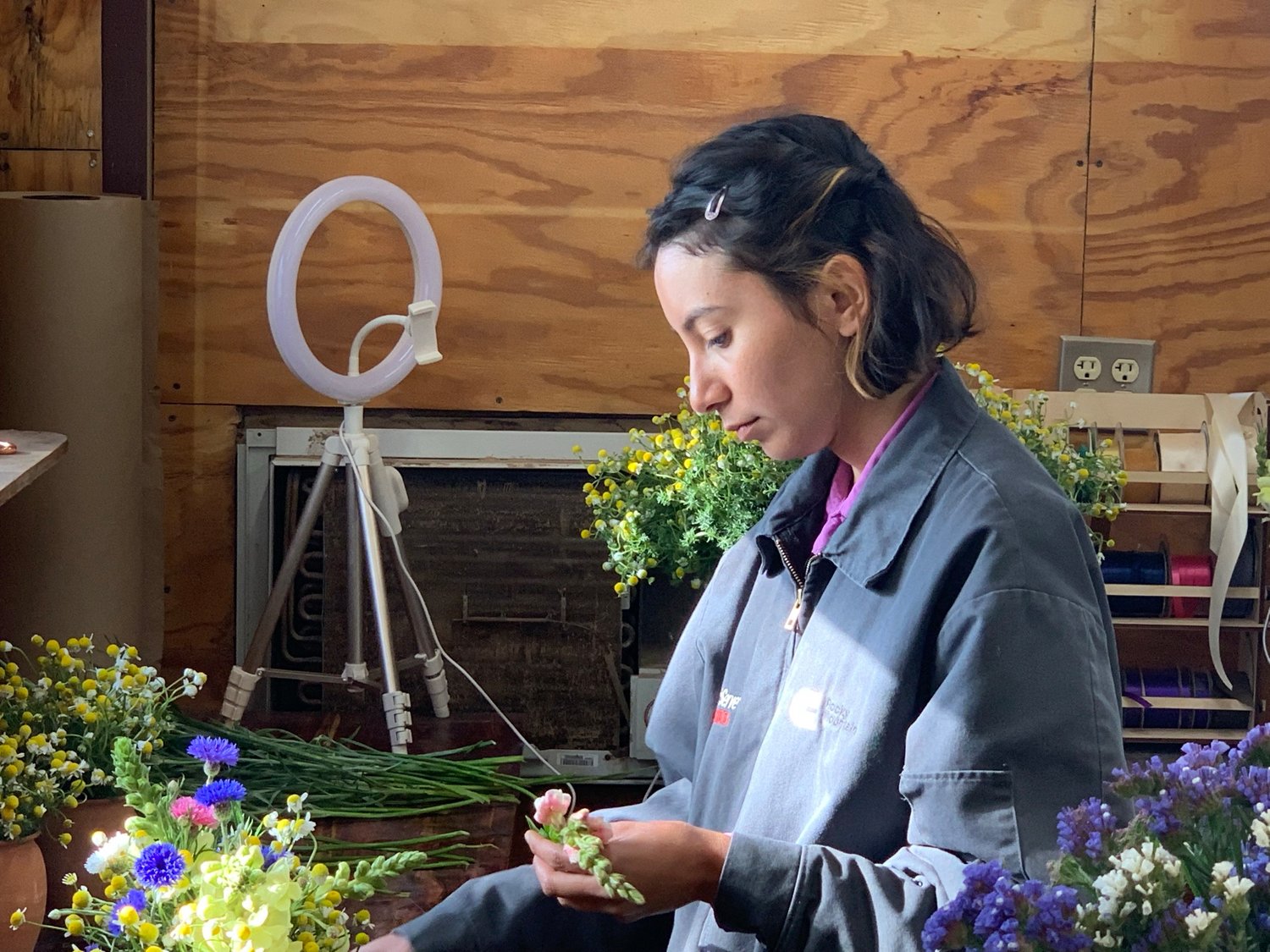 Selena Blanco is a flower arranger who works  at the Calhoun Flower Farms.