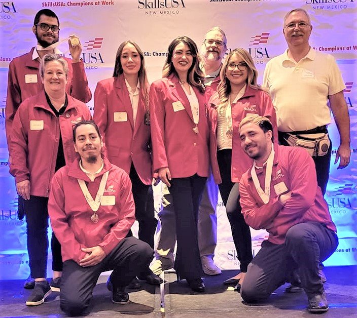 Doña Ana Community College students and staff who participated in the 2022 SkillsUSA New Mexico competition include, left to right, kneeling, Oniel Lopez and Allen Gonzalez; second row: Leilani Benoit, Ciara Quezada, Madison Cammarata and Daisy Lopez; and back row: Kyros Ervin and DACC staff members John Carter and Tim Chappell, Ph.D.