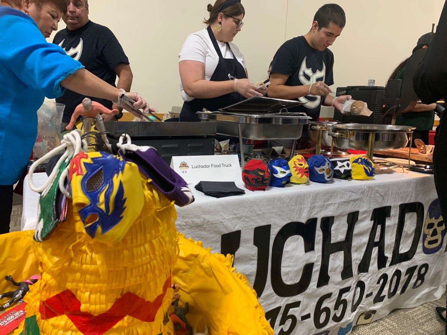 Luchador food truck employees provided delicious samples during Taste of Las Cruces.