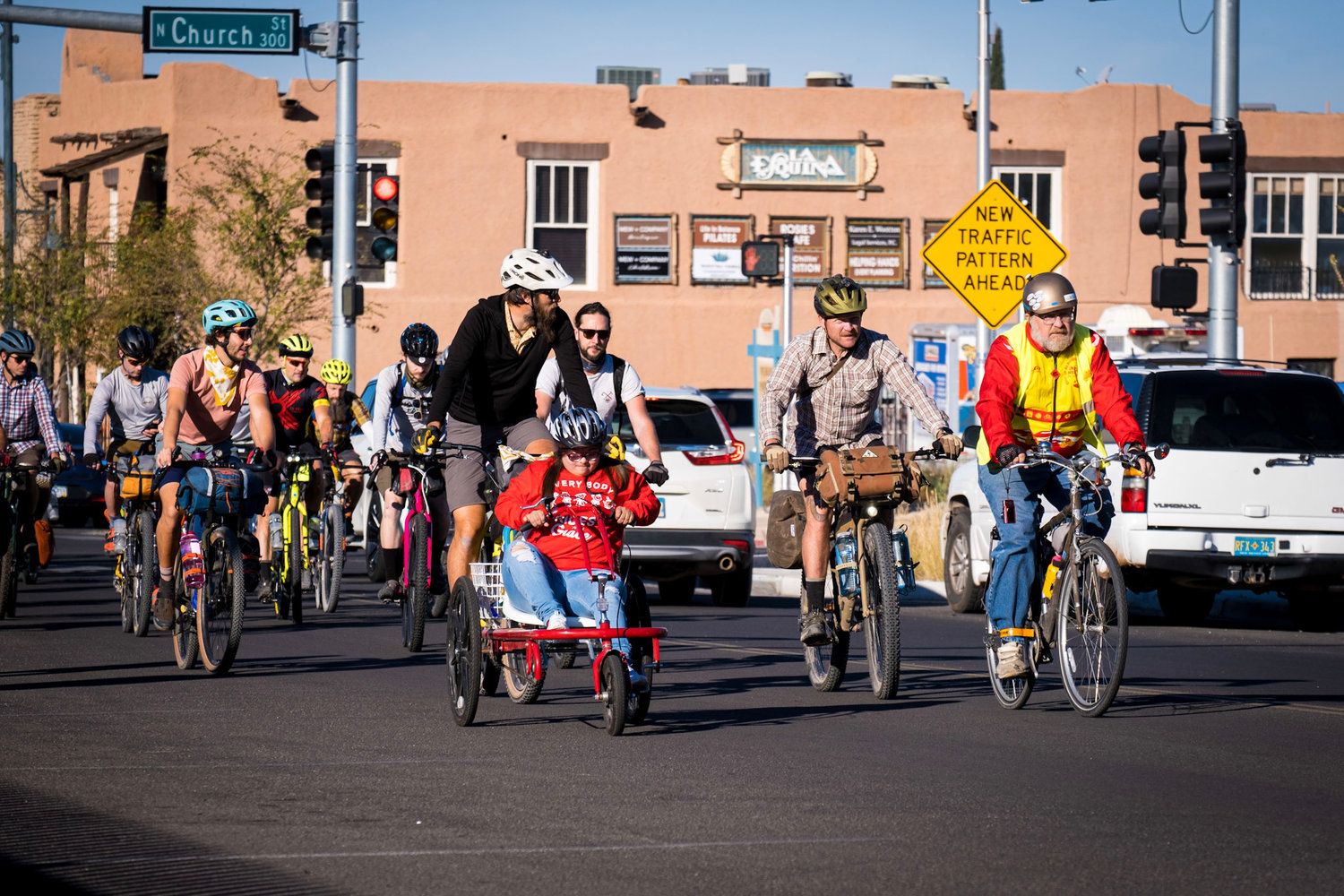 Grace Holguin and her adaptive cycle at the October 2021 New Mexico Bikepacking Summit, where she led the Dangerbird Grand Depart. At far right is Velo Cruces Board President and Las Cruces bicycling advocate George Pearson.