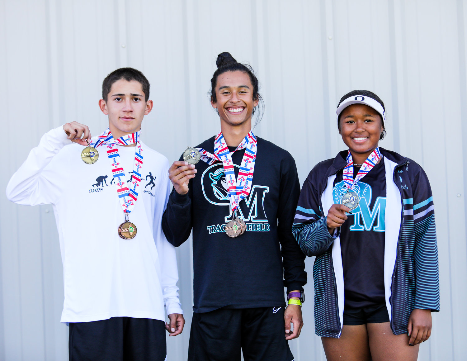 Organ Mountain's James Limon, Jonathan "J.T." Torres and Shaolin Munir all won individual 5A state track championships for Organ Mountain High.