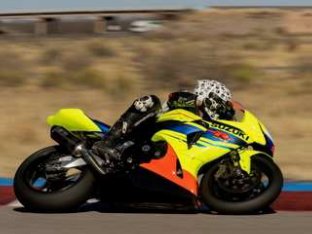 Las Cruces motorcycle test rider/engineer Josh Kauffman on K-Link modified Suzuki