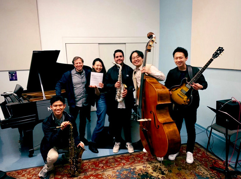 Orlando Madrid, standing third from left, with the Chris Potter Ensemble at New York University. “It was a dream come true to study/learn with him (Potter, standing at far left in the photo) and perform in his ensemble,” Madrid said.