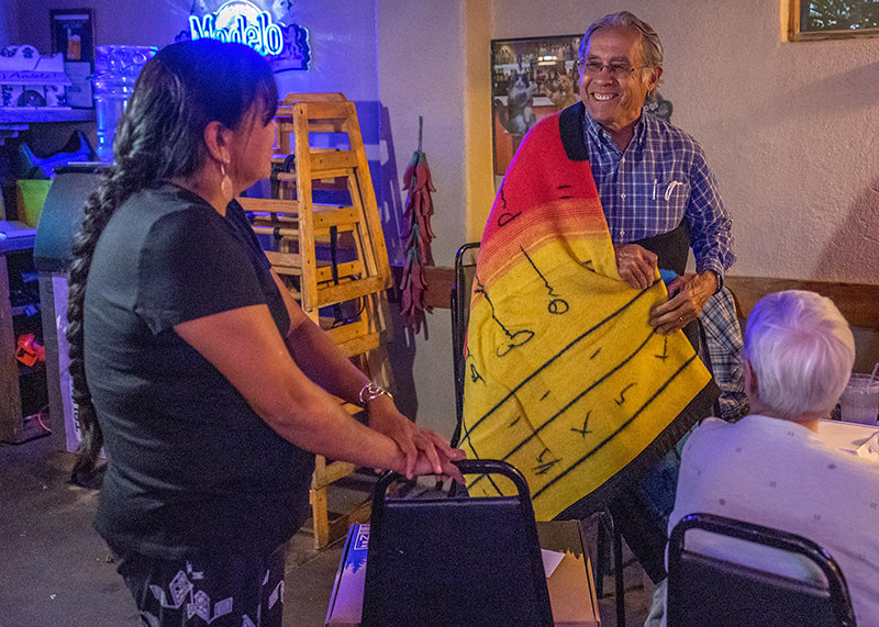 At his retirement party, Anthropology Professor Don Pepion received a special gift from the Department of Anthropology faculty – a blanket from Eighth Generation, a Seattle-based brand owned by the Snowqualmie Tribe.