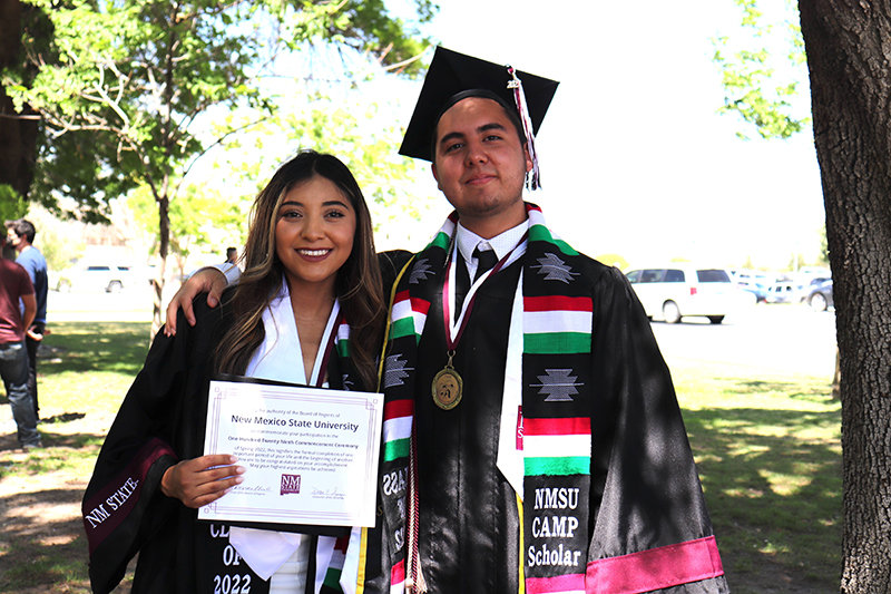From left: CAMP May 2022 graduates Sheyla Gutierrez, bachelor’s degree of business administration in management with Honors, and Daniel Grajeda, bachelor’s degree of business administration in finance and bachelor’s degree in Spanish with honors and a Crimson Scholar.