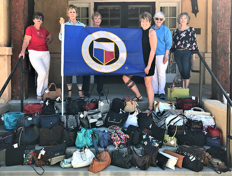 The Progress Club of Las Cruces’ Done in a Day project included filling 110 gently used purses with feminine and hygiene products, gift cards, and cosmetics and delivering them to La Casa, Inc. domestic shelter in Las Cruces. Left to right are Progress Club state past-president Inge Peter and Las Cruces club members Mary Dohm, Sue Mydland, Debbie McAllen and Robin Cline.