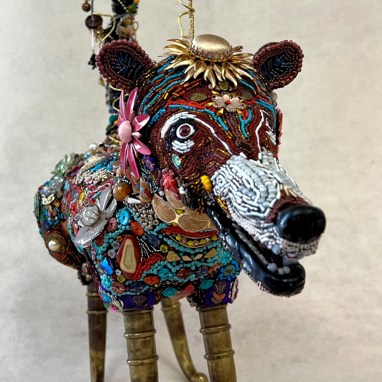 Grant County Art Guild Gallery holds a critters show, this is Beaded Coatimundi by Marsha Banas.