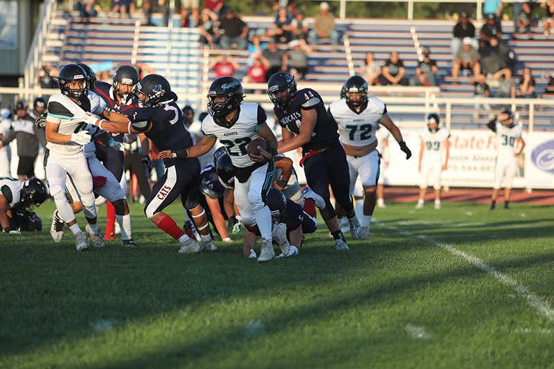 Abe Romero, No. 22, carries the ball for Organ Mountain High School against Deming Aug. 26, the game in which he sustained a life-threatening injury.