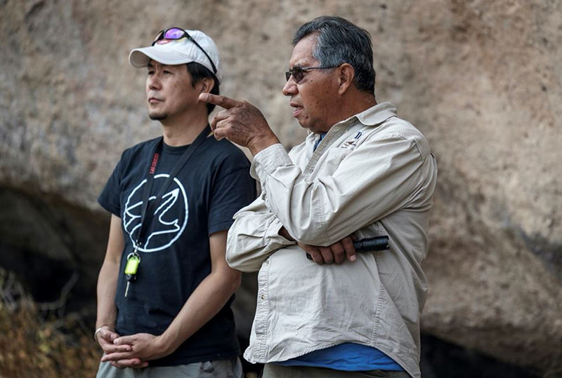 NMSU University Museum Director Fumi Arakawa, left, and Zuni tribal elder Octavius Seowtewa in Chavez Cave.