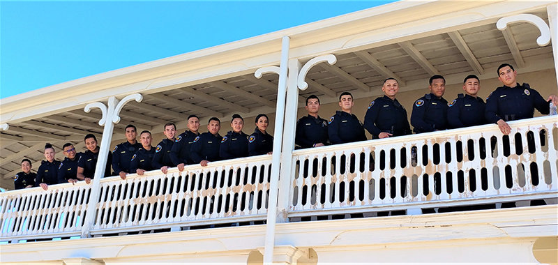 The newest members of the Las Cruces Police Department on the upstairs balcony of the historic Armijo House, 150 E. Lohman Ave., which is home to the Greater Las Cruces Chamber of Commerce.