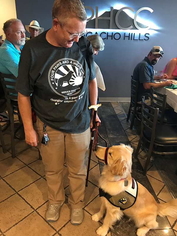 Officials from 4 Paws and a Wake Up, along with golden retriever SeaBee, were on hand at the 2022 Progress Club golf tournament, held Sept. 24 at Picacho Hills Country Club, to receive a donation check.