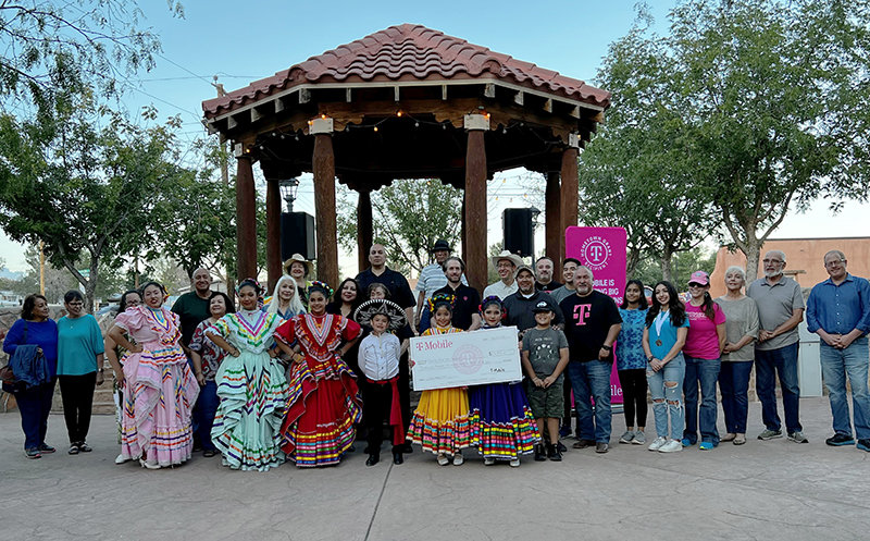 Members of the Village of Doña Ana receive a grant from T-Mobile officials of a grant of more than $36,500 to help beautify the historic Doña Ana plaza with the addition of benches and trash receptacles.