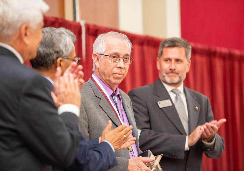 New Mexico State University alumnus Richard Leza, center, was inducted into the 2021 NMSU Entrepreneur Hall of Fame by Arrowhead Center and the Office of the Vice President for Research and Graduate Studies.